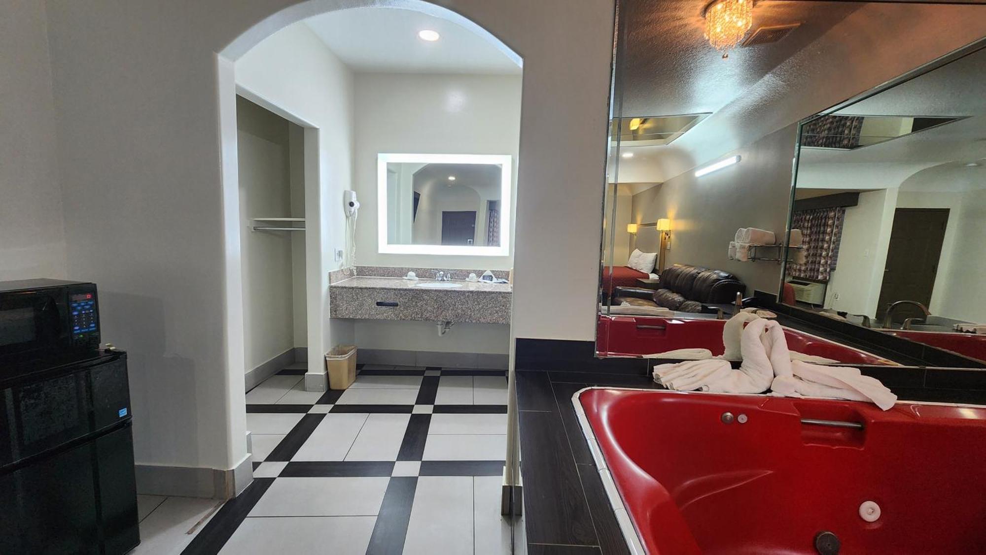 Scottish Inn & Suites Sam Houston Parkway Buitenkant foto