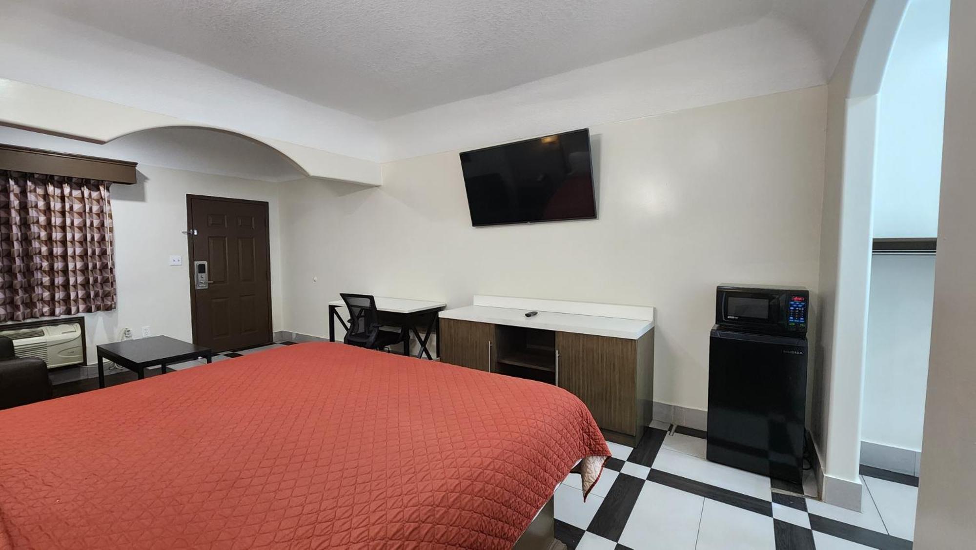 Scottish Inn & Suites Sam Houston Parkway Buitenkant foto
