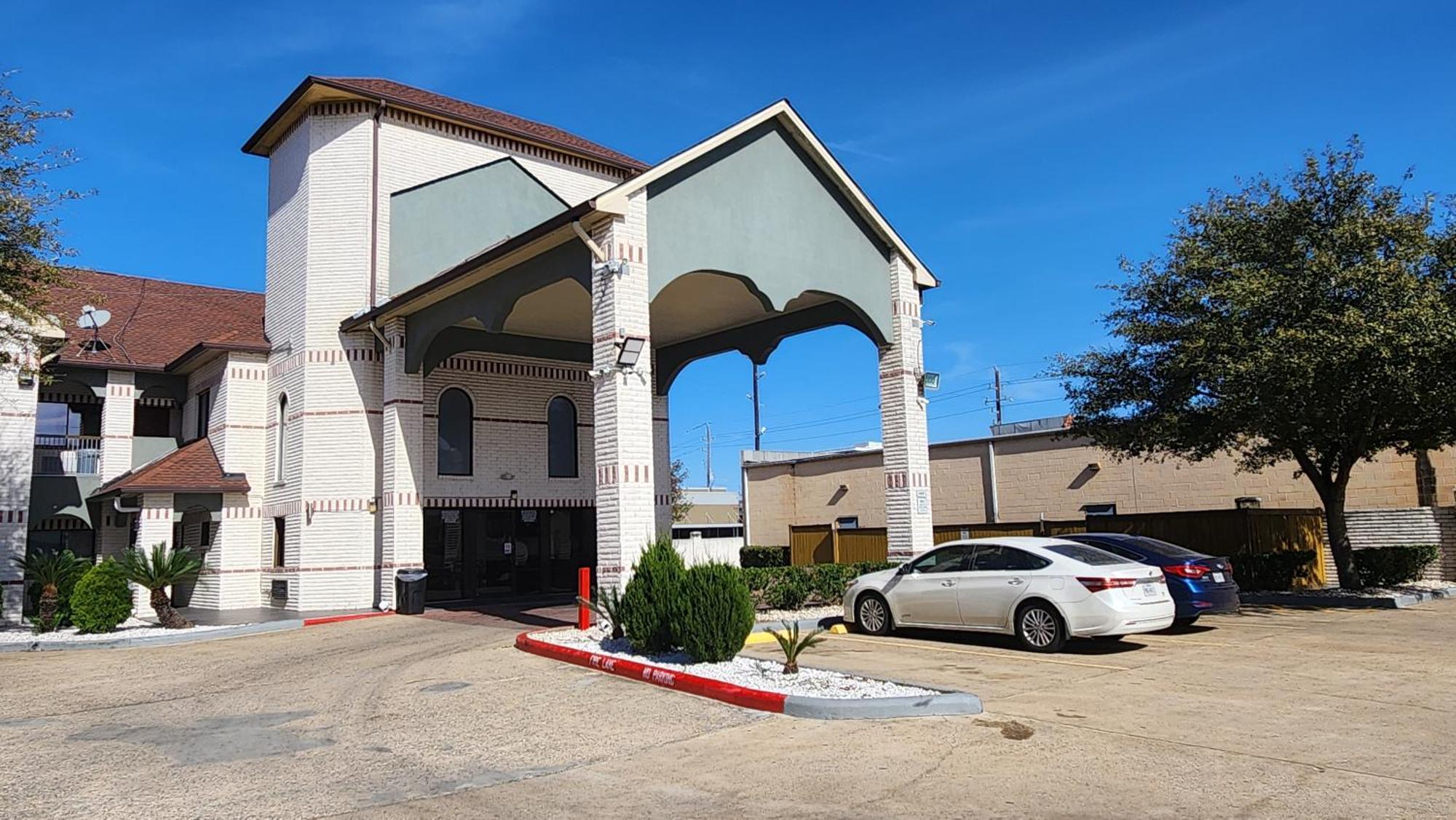 Scottish Inn & Suites Sam Houston Parkway Buitenkant foto